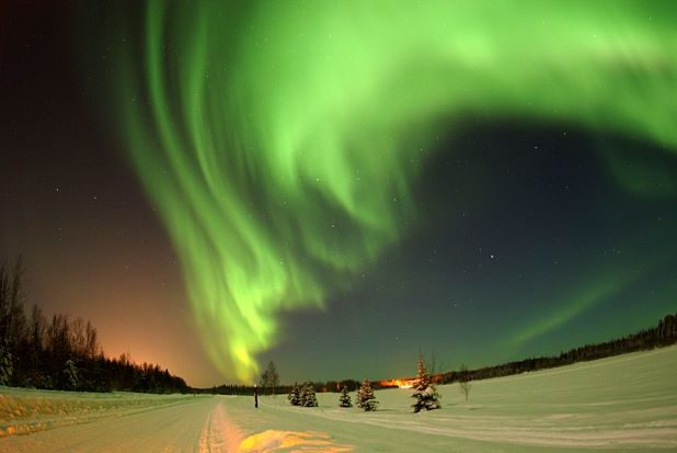 Snow landscapw with northern light sky