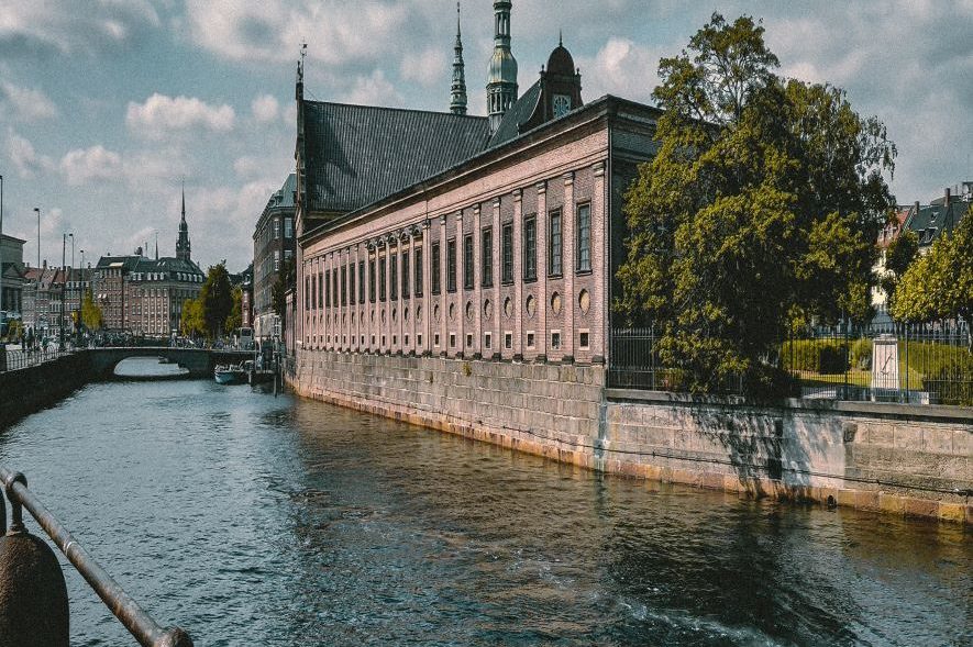 View of the old building Børsen in Copenhagen from the canal side