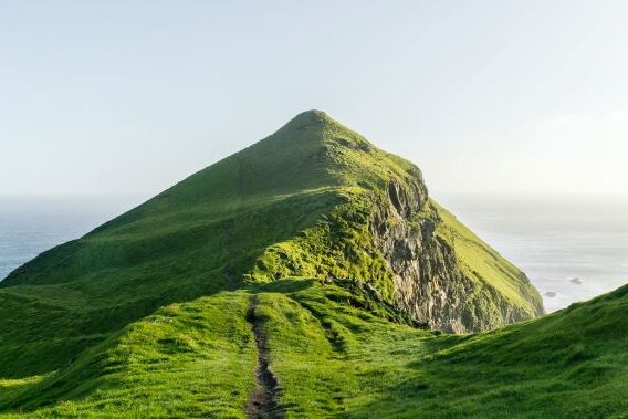 Top a mountain with a path leading to the top