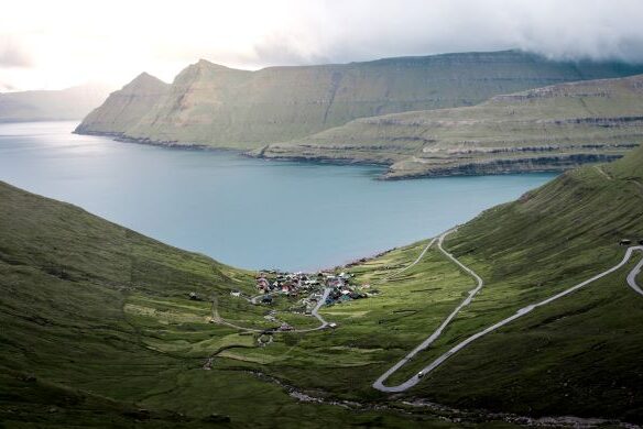 Small village at the bottom of the mountain Faroe Islands