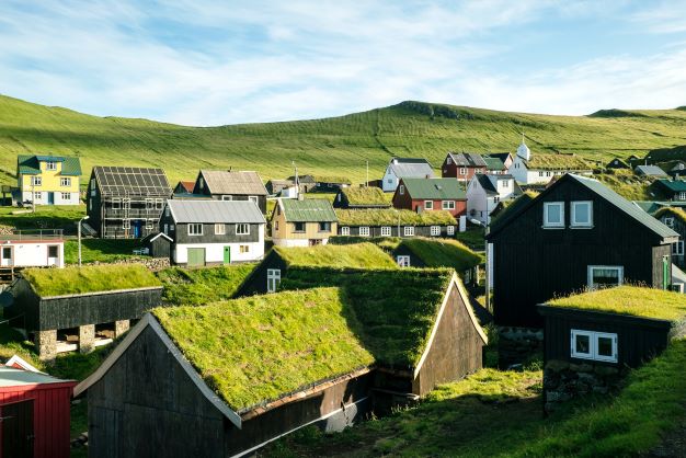 Small village of hoses with grass ruffs on the Faroe Islands