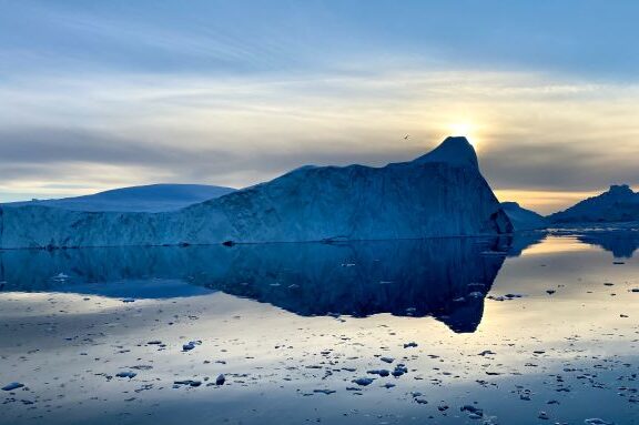 Iceberg in sunset